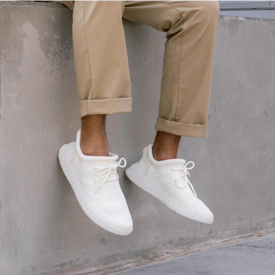 Man wearing Full White Baliston Smart Shoe and khaki pants